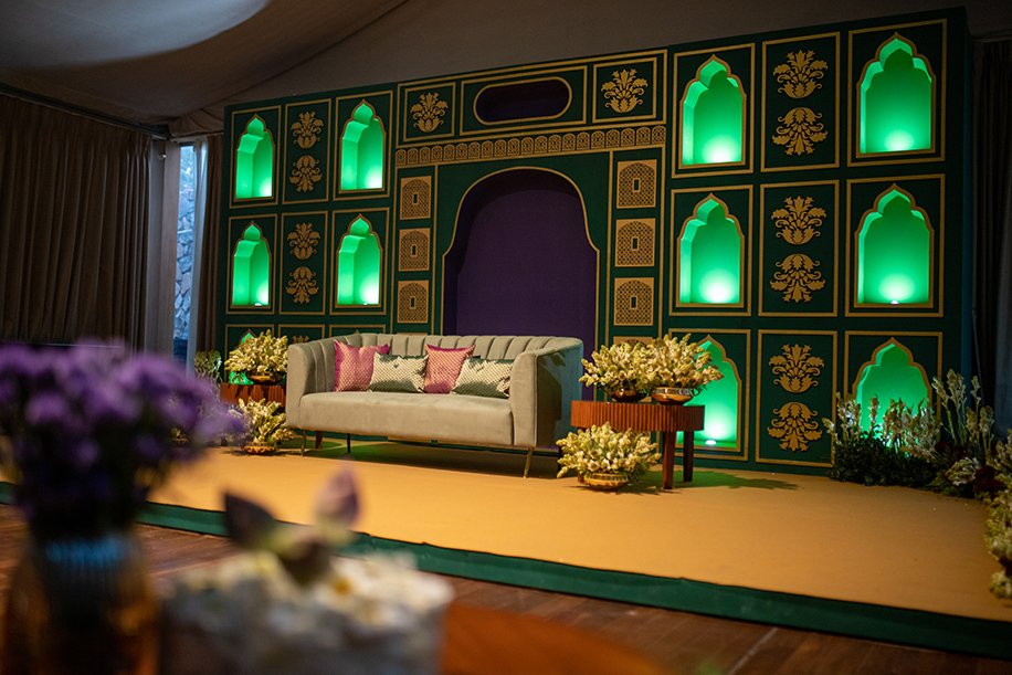 A reception stage in jewel tones