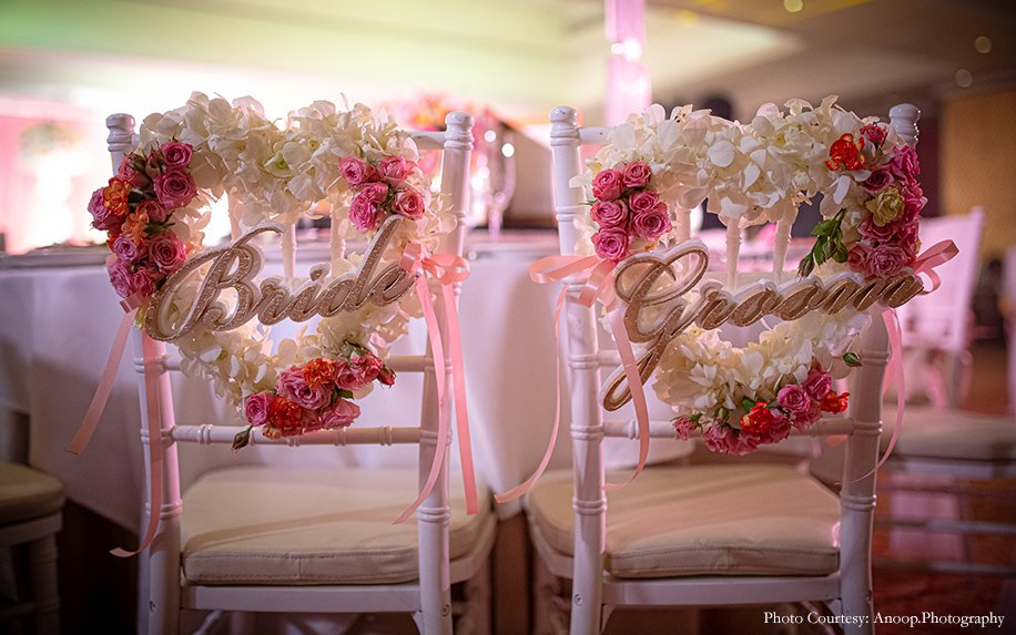 Pink floral chairs for a reception